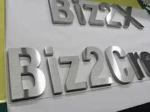 brushed metal letters